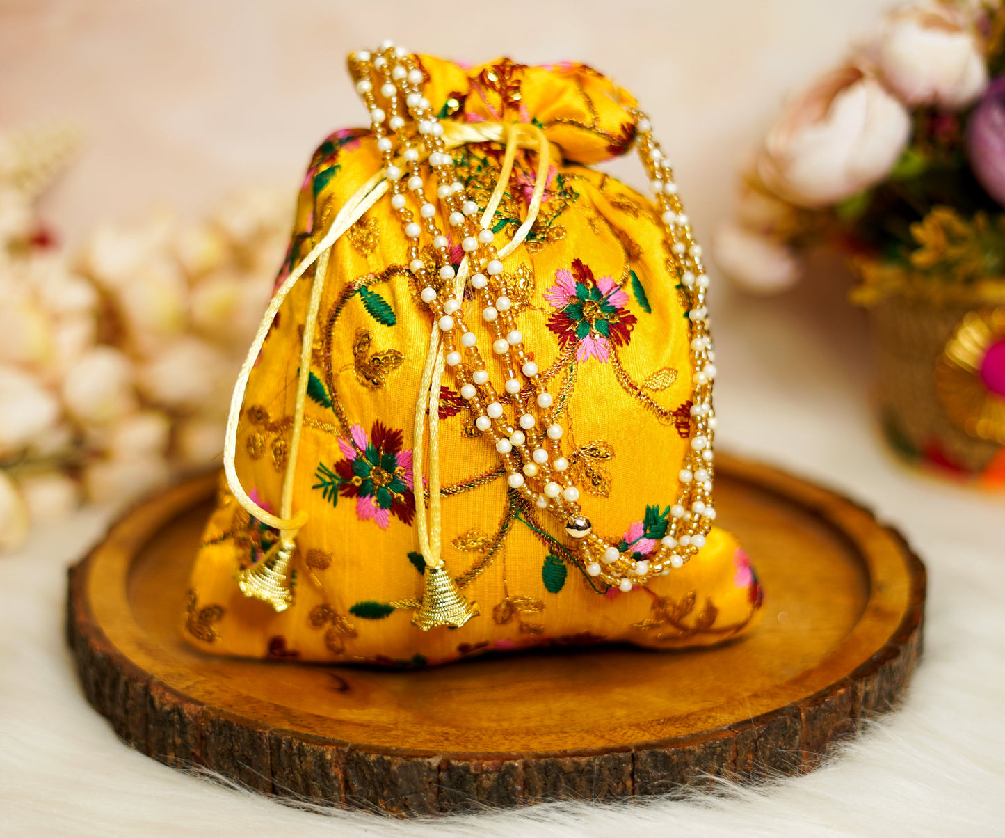 Yellow Embroidered Flower Potli with Pearl Handle