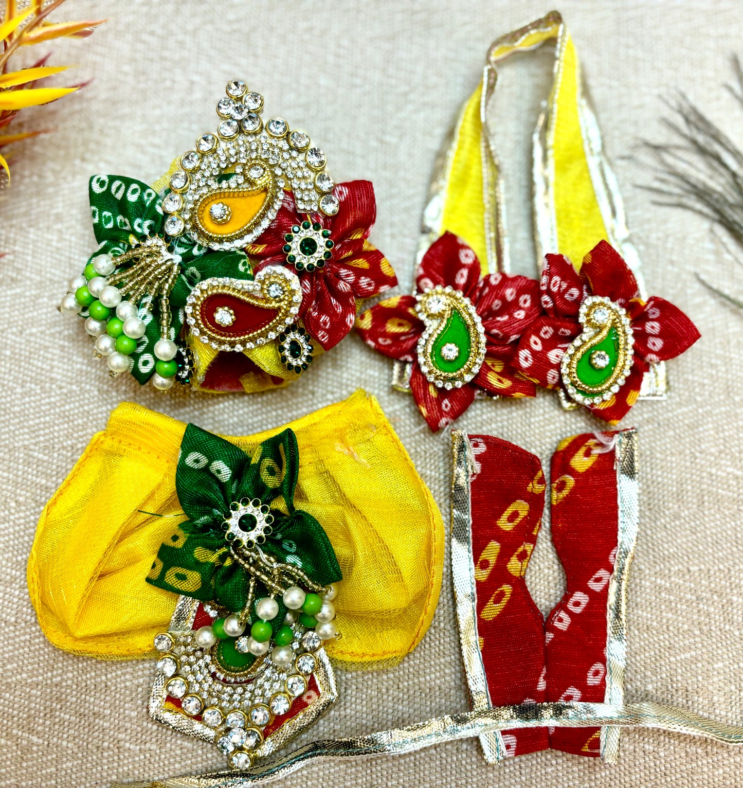 RK Set / Yugal Sarkar / Laxmi ji & Ganesh ji Set Yellow & Red Bandhej Lehenga & Dhoti - 7 piece set