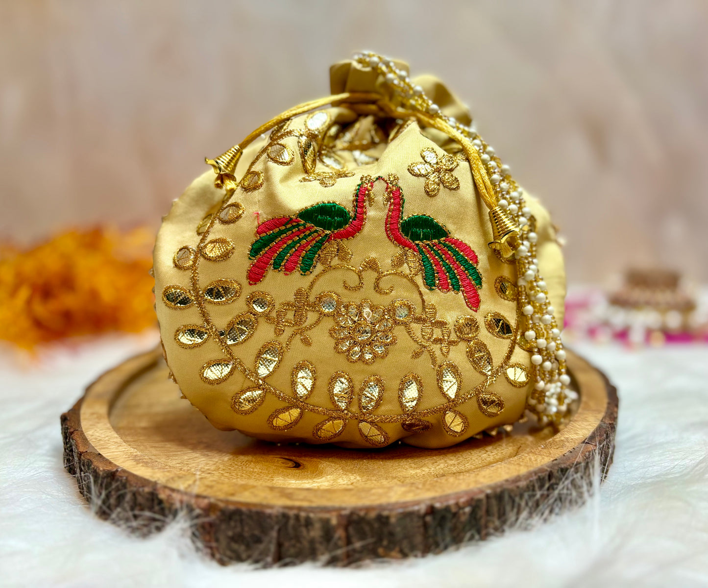 Golden beige Peacock Potli with Pearl Handle